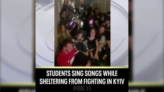 Students sing songs while sheltering from fighting in Kyiv