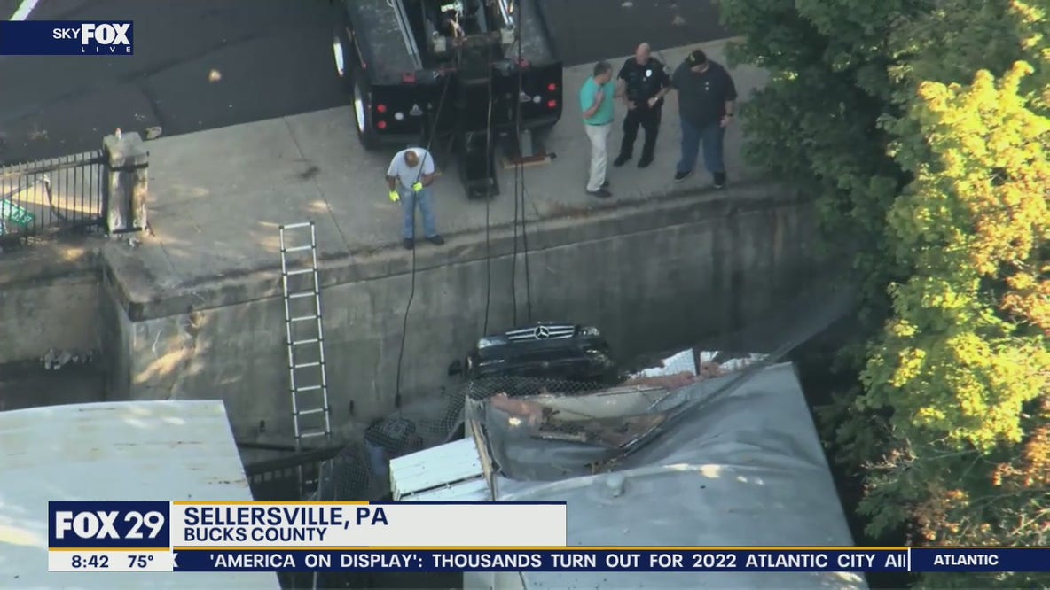 Crews working to pull car from embankment in Sellersville