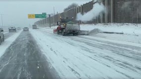 MnDOT plow clearing snow on I-35W during Wednesday's storm