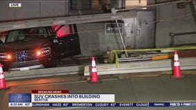SUV crashes into Downtown Seattle building