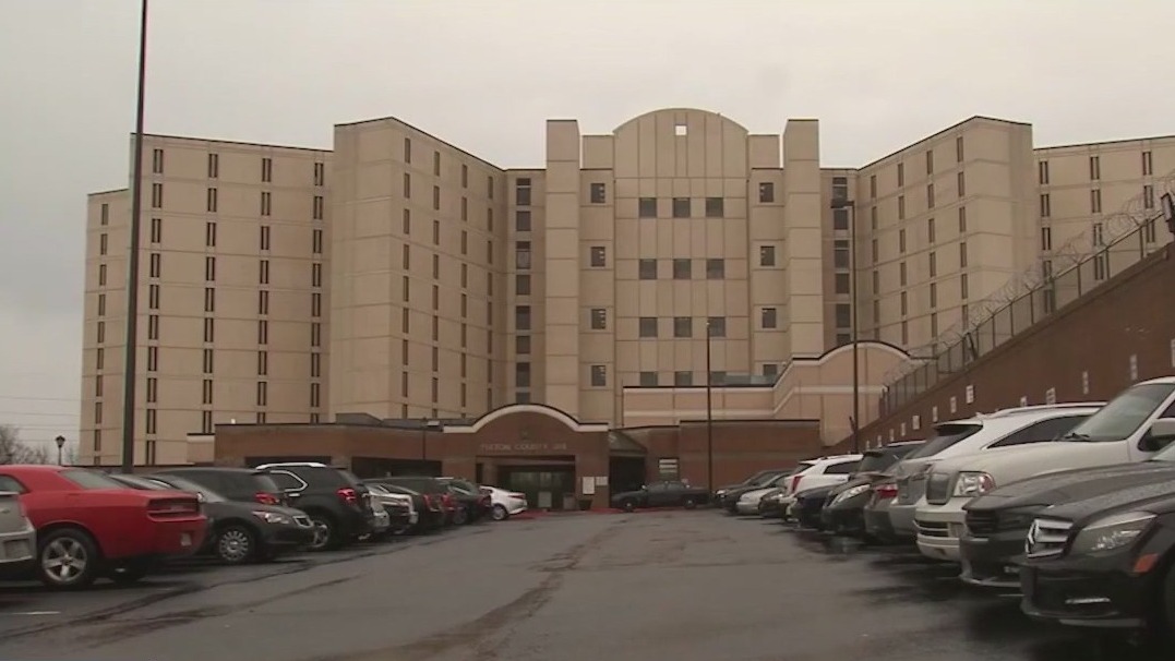 Fulton County sheriff fires employee over overtime checks