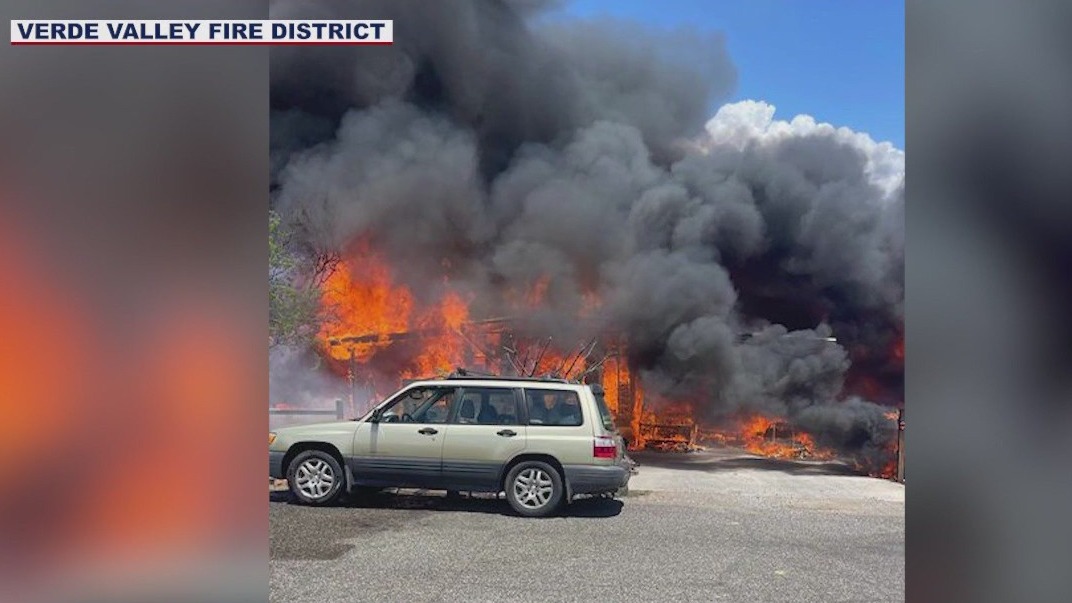 Brush fire burns structures near Cottonwood