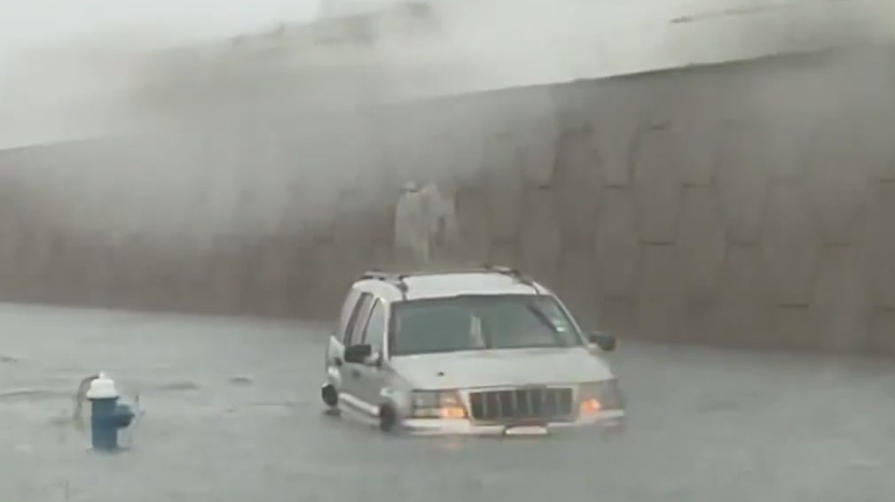 Jeep trapped in Houston floodwaters during severe weather