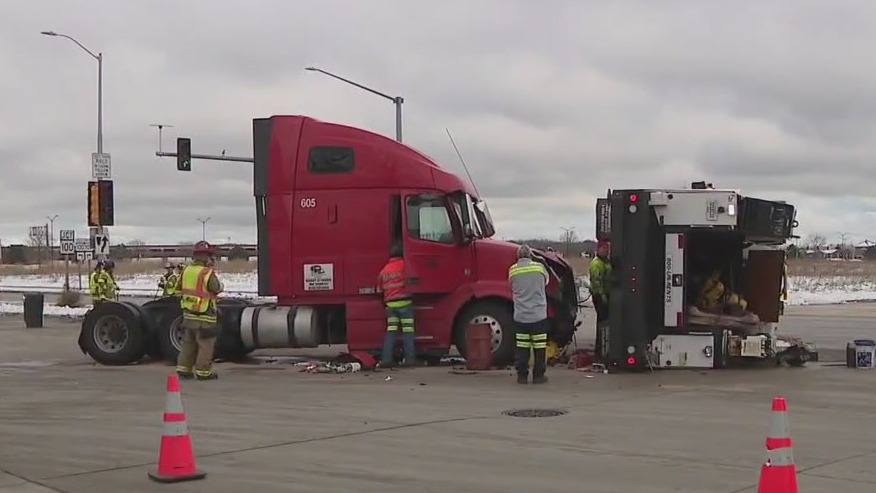 Oak Creek semi, utility truck crash, We Energies' worker to the rescue