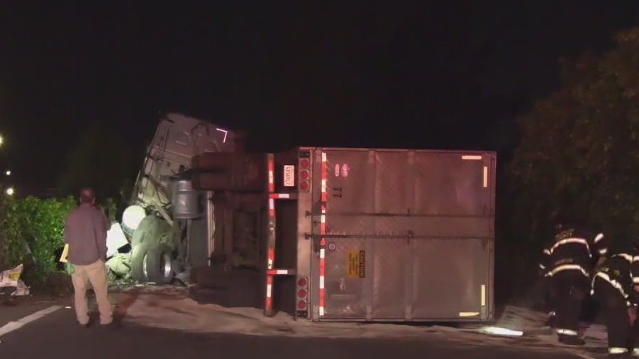 Big rig overturns on East Bay freeway ramp