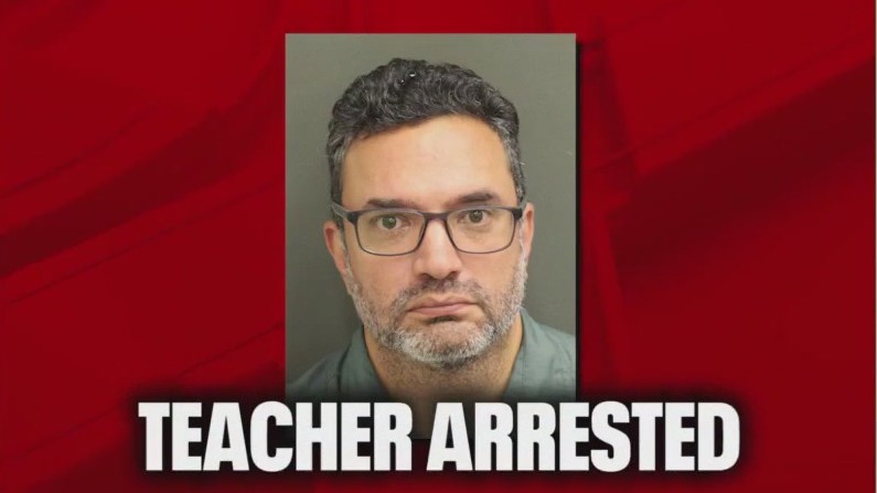 Teacher accused of touching students