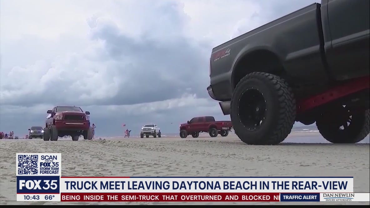 Truck Meet leaving Daytona Beach in rear-view