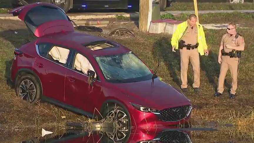 At least 1 hurt after car goes into Orange County pond, troopers say