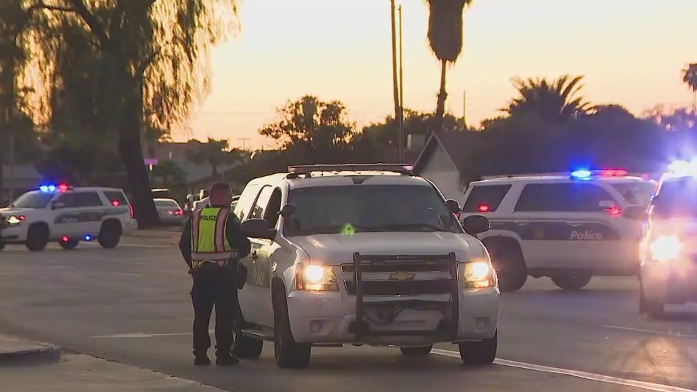Phoenix police car, motorcycle involved in crash