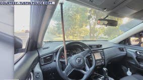 Driver unhurt after metal rod flies through windshield