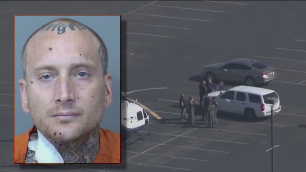 Alleged Phoenix bank robber fired 26 rounds at police helicopter before being shot, court documents say