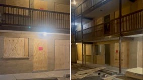 Video shows boarded-up apartments in Harvey where tenants were allegedly trapped