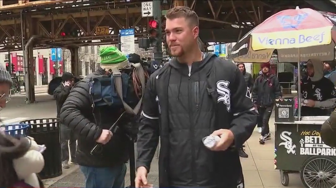 White Sox players give out hot dogs in Chicago ahead of opening day