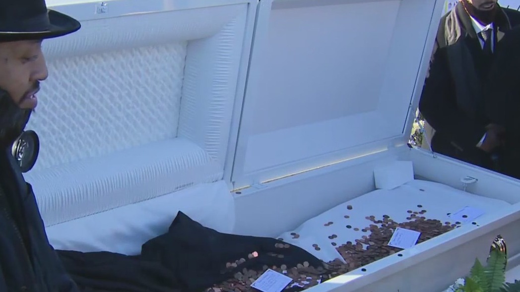 Mock funeral for the penny