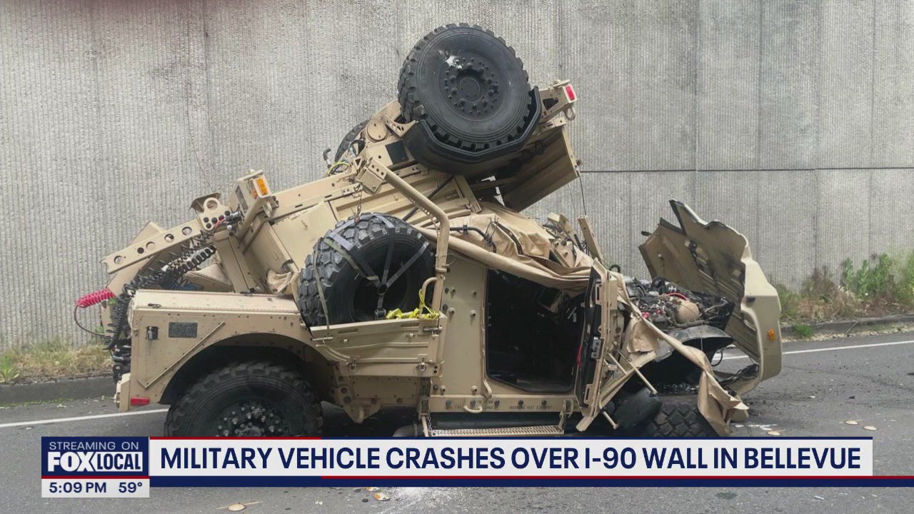 Military vehicle crashes over I-90 wall in Bellevue, WA