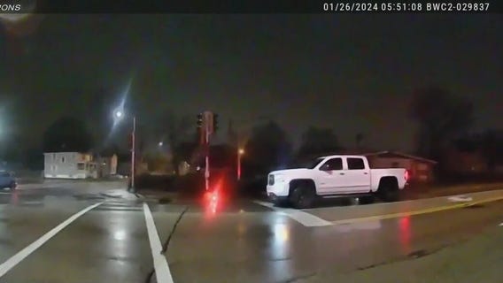 Police officer hit by truck