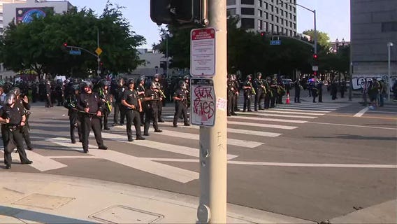 Los Angeles police push back protesters