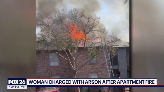 Woman charged with arson after Harris Co apartment fire