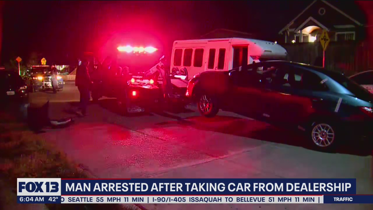 Man arrested after taking car from Seattle dealership