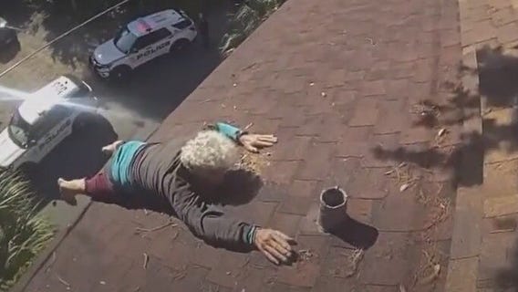 Tampa police rescue 86-year-old who got stuck on roof