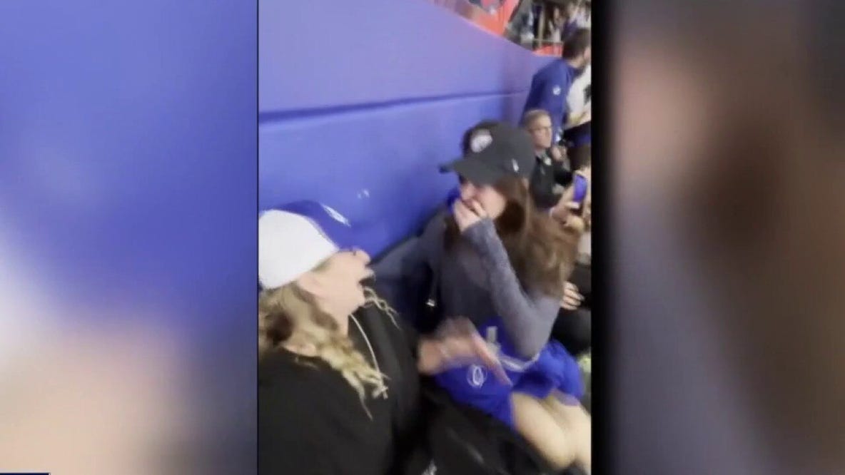 Woman living abroad in Australia surprises best friend at Lightning home game: 'Tears were shed'