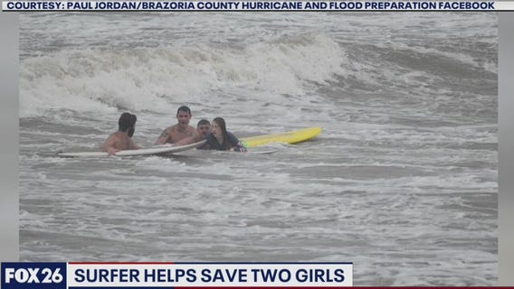 Surfers rescue girls in rough water
