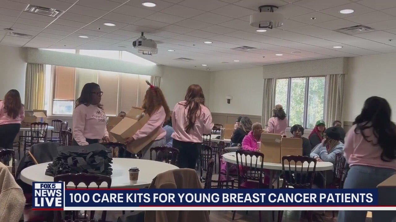 Volunteers pack 100 care kits for young breast cancer patients