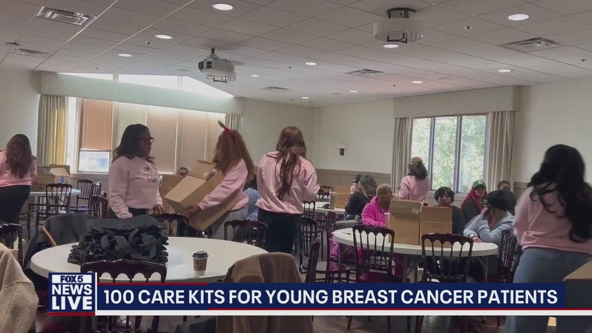 Volunteers pack 100 care kits for young breast cancer patients