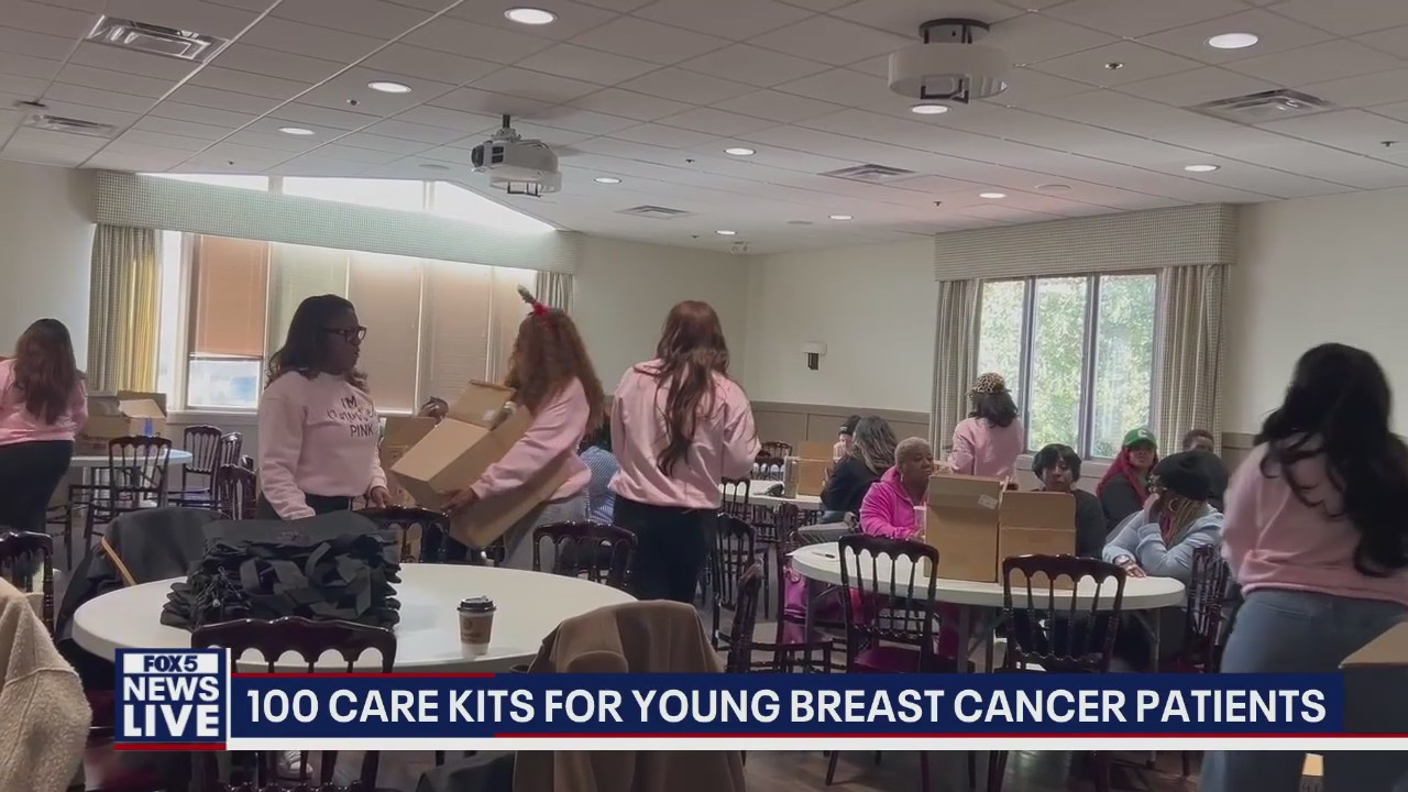 Volunteers pack 100 care kits for young breast cancer patients
