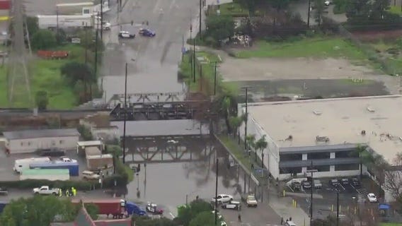 CA storm: Cars submerged in water in Long Beach