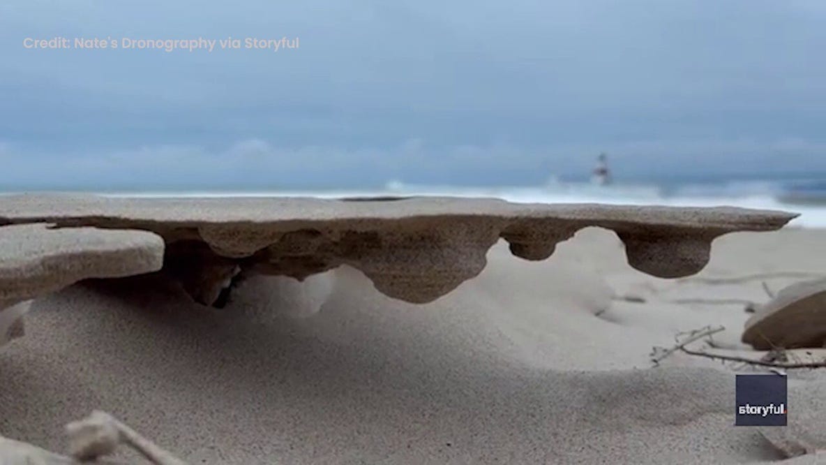 Wind, freeze team up to sculpt rare sand pillars along Lake Michigan