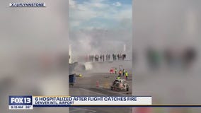 American Airlines plane catches fire in Denver, CO