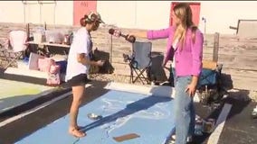 Artists paint parking spaces for pride at Se7en Bites