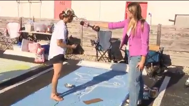 Artists paint parking spaces for pride at Se7en Bites