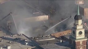 Fire officials provide update after extra-alarm fire rages at warehouse in Back of the Yards
