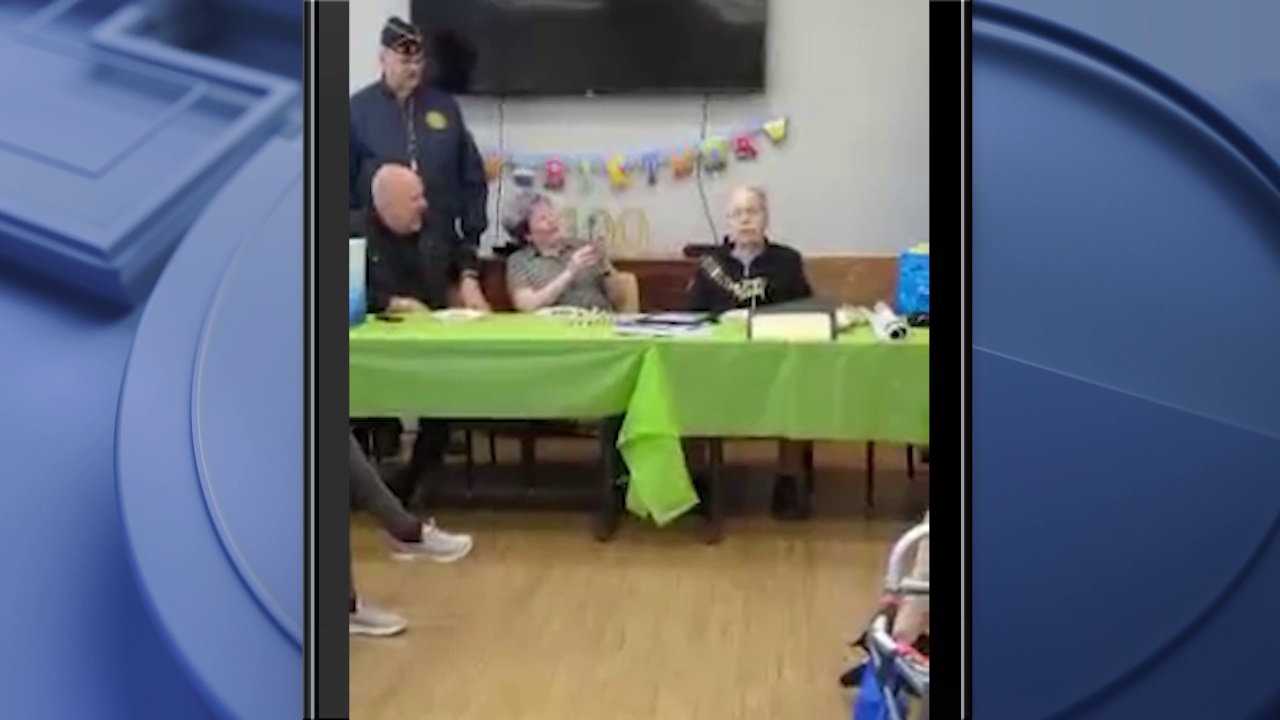 World War II veteran Stanley Spillar sings 'God Bless America' on his 100th birthday