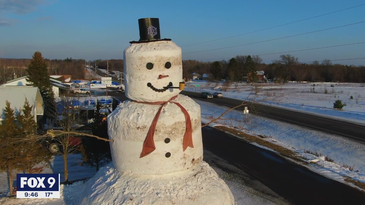 Family builds more than 40 foot tall, super-sized snowman in Milltown, Wis.