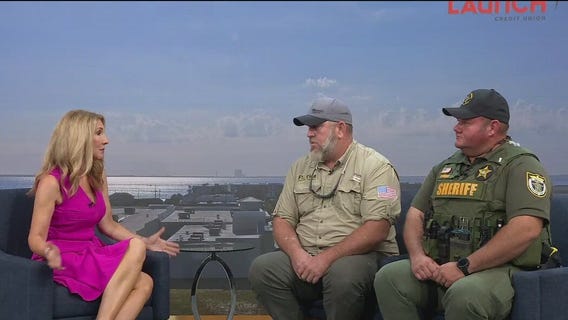 Florida crews help free mom dolphin from fishing line