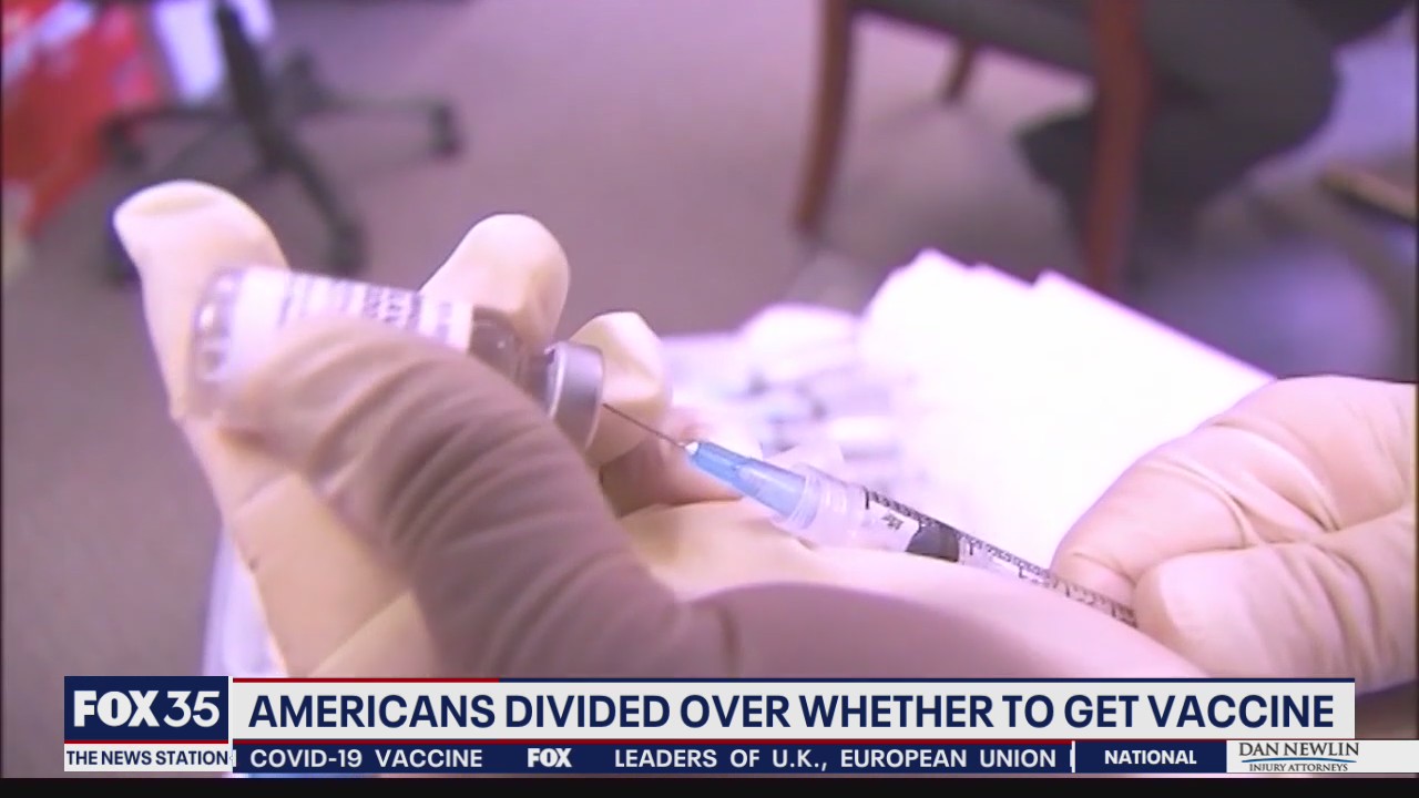Americans divided over whether to get COVID-19 vaccine