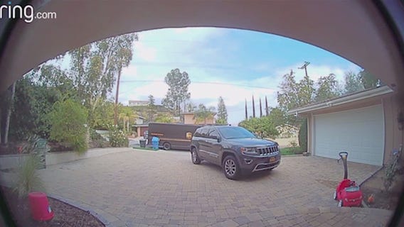 UPS driver robbed at gunpoint