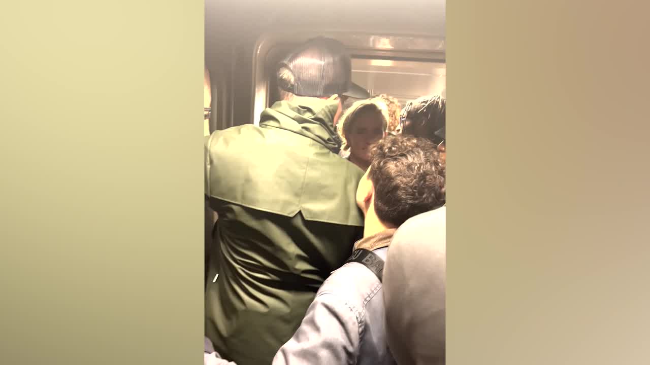Passengers on stalled New York City subway train