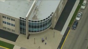 Mom put gun inside kindergartner's backpack, who then brought it to school: police