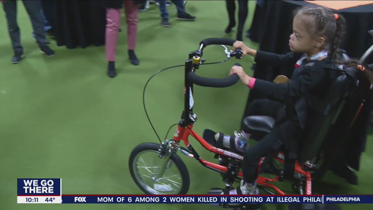 Girl with Down syndrome gets custom adaptive bike donated by non-profit, Philadelphia Flyers