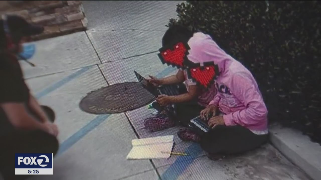 Digital divide encapsulated in photo of girls using WiFi technology