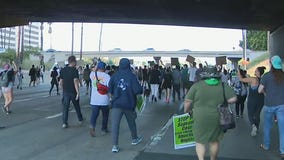 Demonstrators march on 110 Freeway by downtown LA after Roe v. Wade overturned