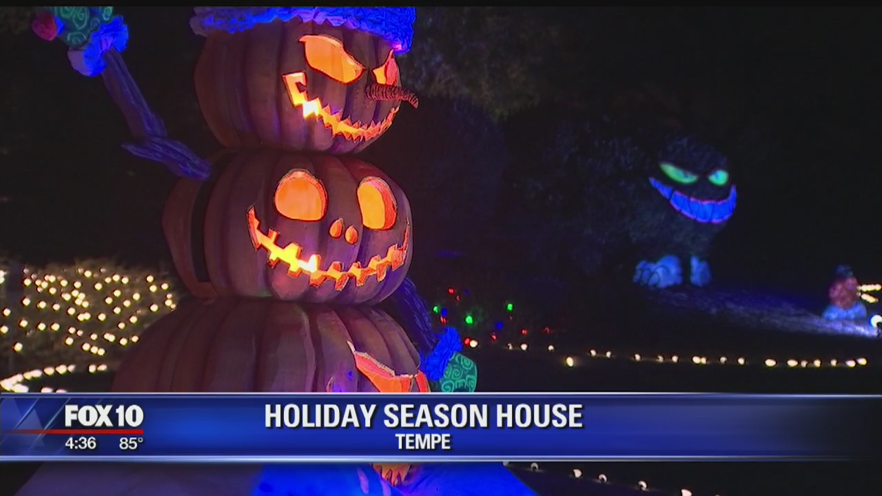Tempe homeowners celebrate the holiday season by decorating for Halloween and Christmas at once