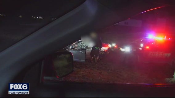 Video shows pursuit that ended with man holding knife, baby