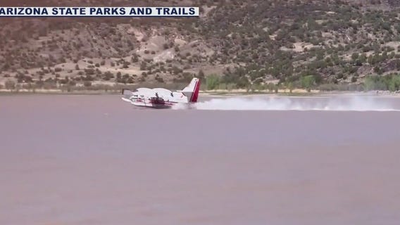 Air tankers fill up at Lyman Lake to battle Greer Fire