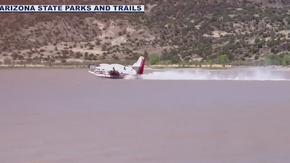 Air tankers fill up at Lyman Lake to battle Greer Fire