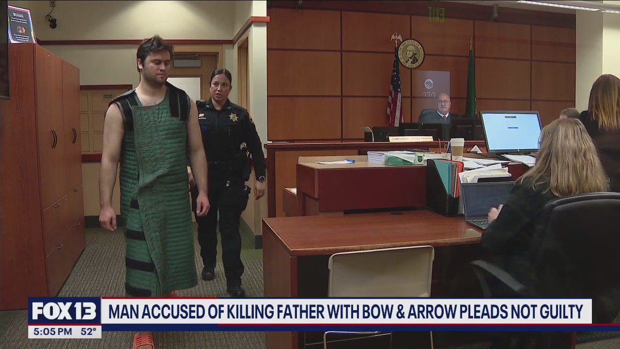 Man accused of killing father with bow and arrow pleads not guilty ...